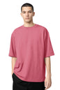 Homme portant le T-shirt OKEN Oversize 230 GSM, plusieurs coloris disponibles, STYCLOV, au style streetwear moderne.