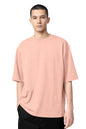 Homme portant le T-shirt OKEN Oversize 230 GSM, plusieurs coloris disponibles, STYCLOV, au style streetwear moderne.