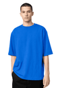 Homme portant le T-shirt OKEN Oversize 230 GSM, plusieurs coloris disponibles, STYCLOV, au style streetwear moderne.