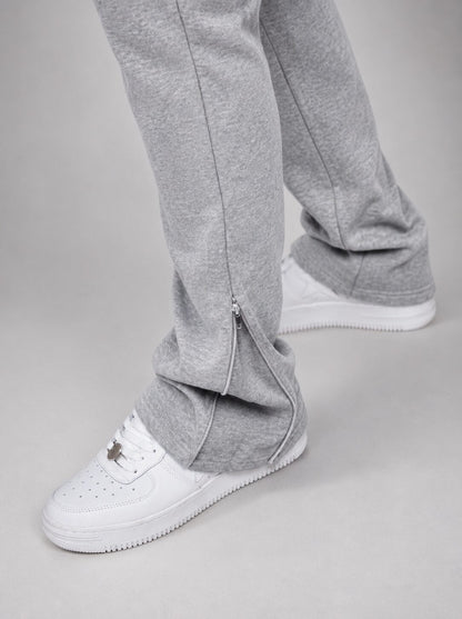 Détail du zip au bas du pantalon du survêtement KENZIR gris chiné